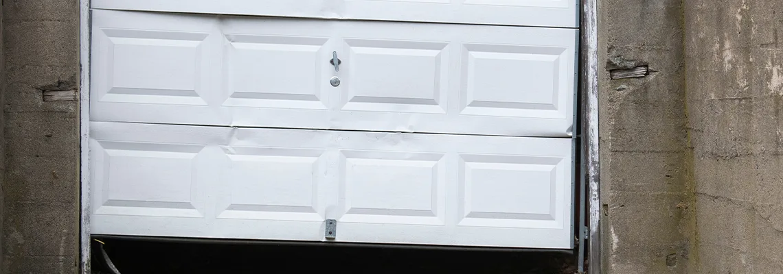 Garage Door Got Hit By A Car Dent Removal in Collinsville, IL