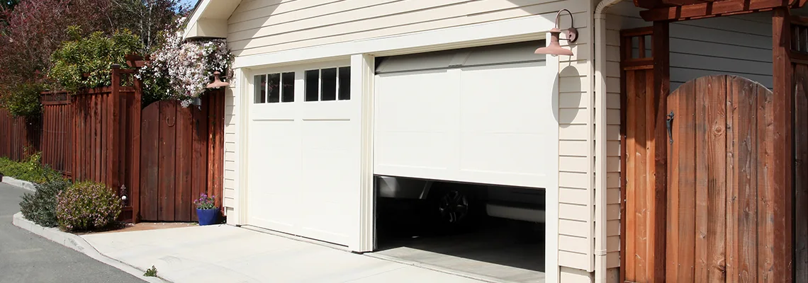 Fix Metal Garage Door Jerking in Collinsville, Illinois